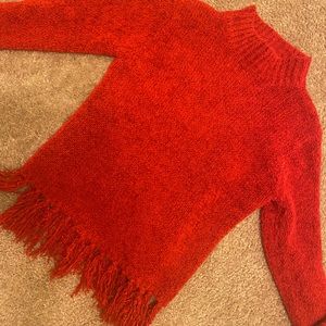 Red sweater fringe bottom mock neck